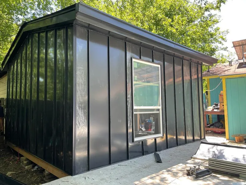 Black standing seam metal wall panels for Roof Inspection in Flagstaff
