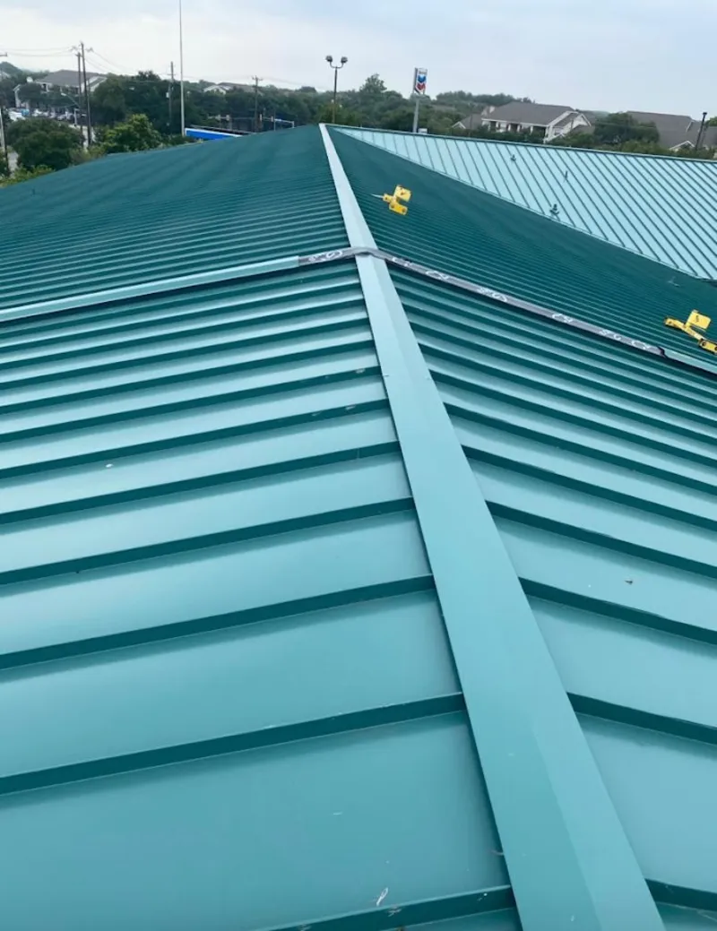 Green commercial metal roof ridge and valley for Metal Roof Repair in Flagstaff