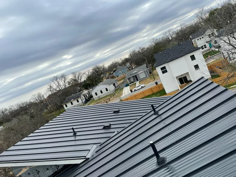 Standing seam metal roof panels with vents for Skylight Repair in Flagstaff